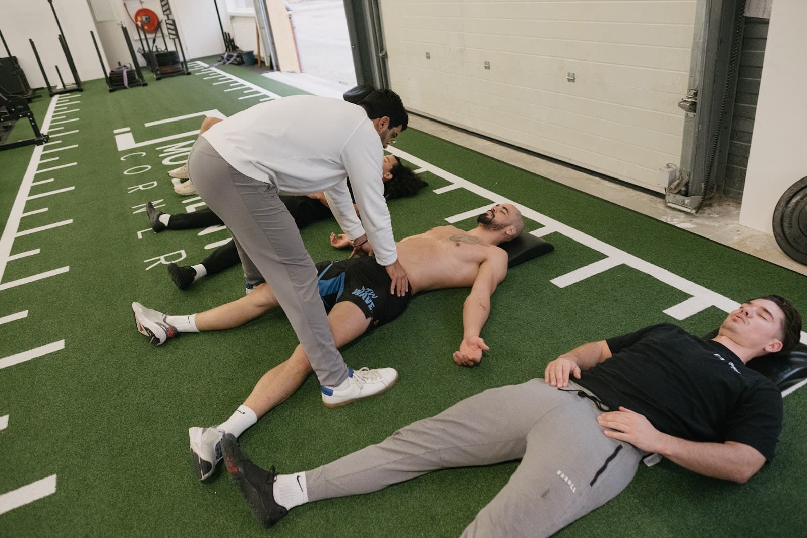 Hands-on movement assessment between coaches