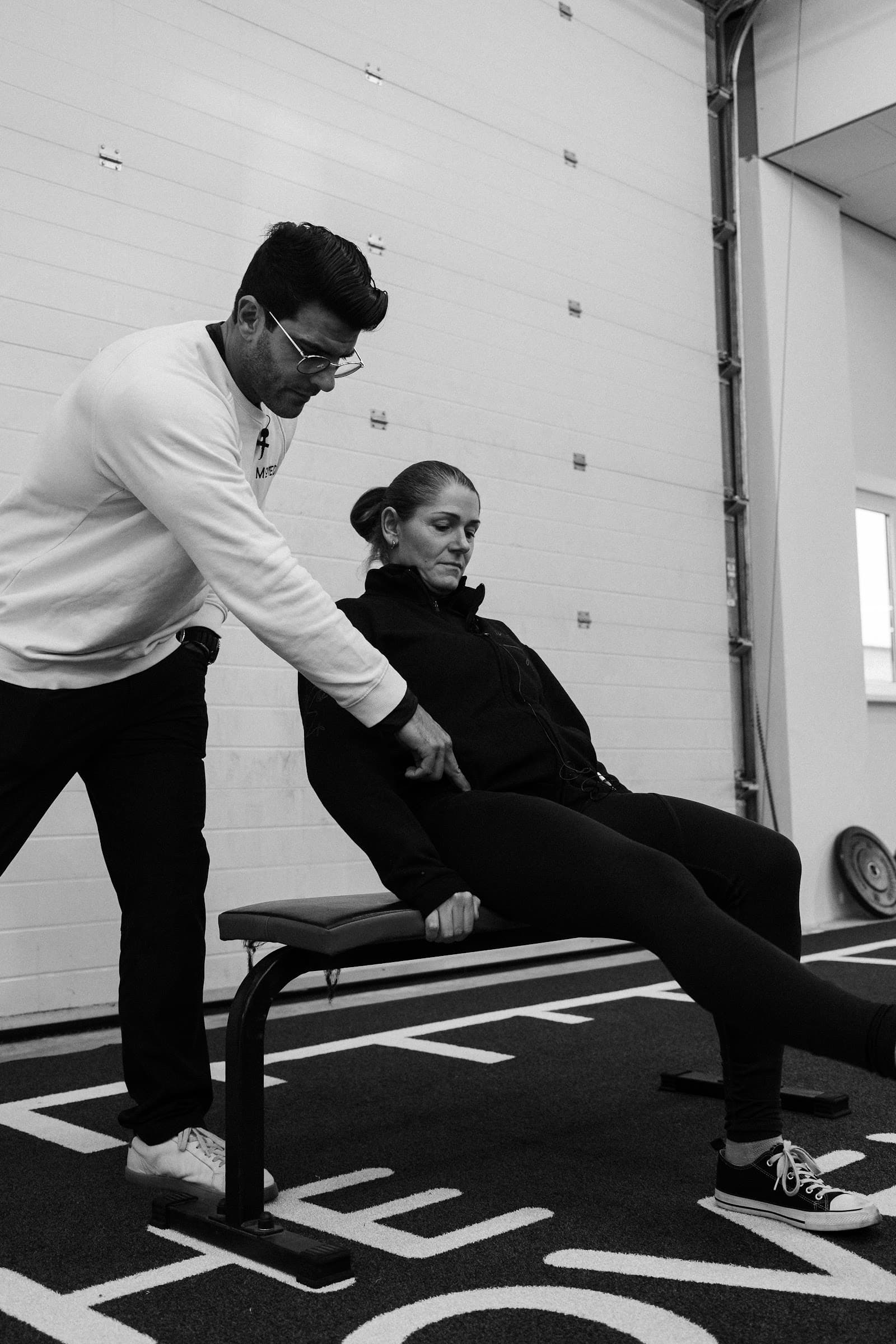 Coach demonstrating a movement pattern during the immersion